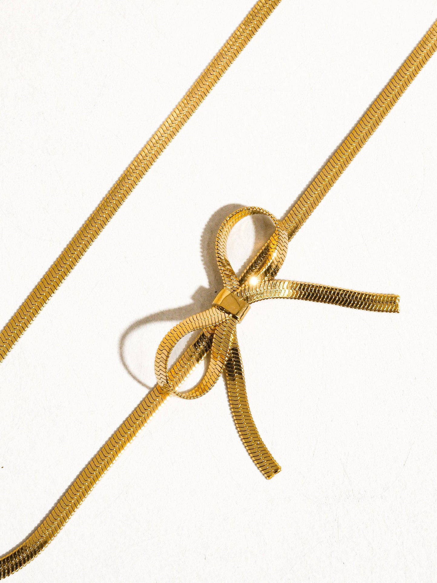 Ezra’s Ribbons 18K Gold Plated Non-Tarnish Flat Snake Bow Choker